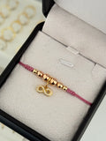 Pulsera infinito circonia oro rosa