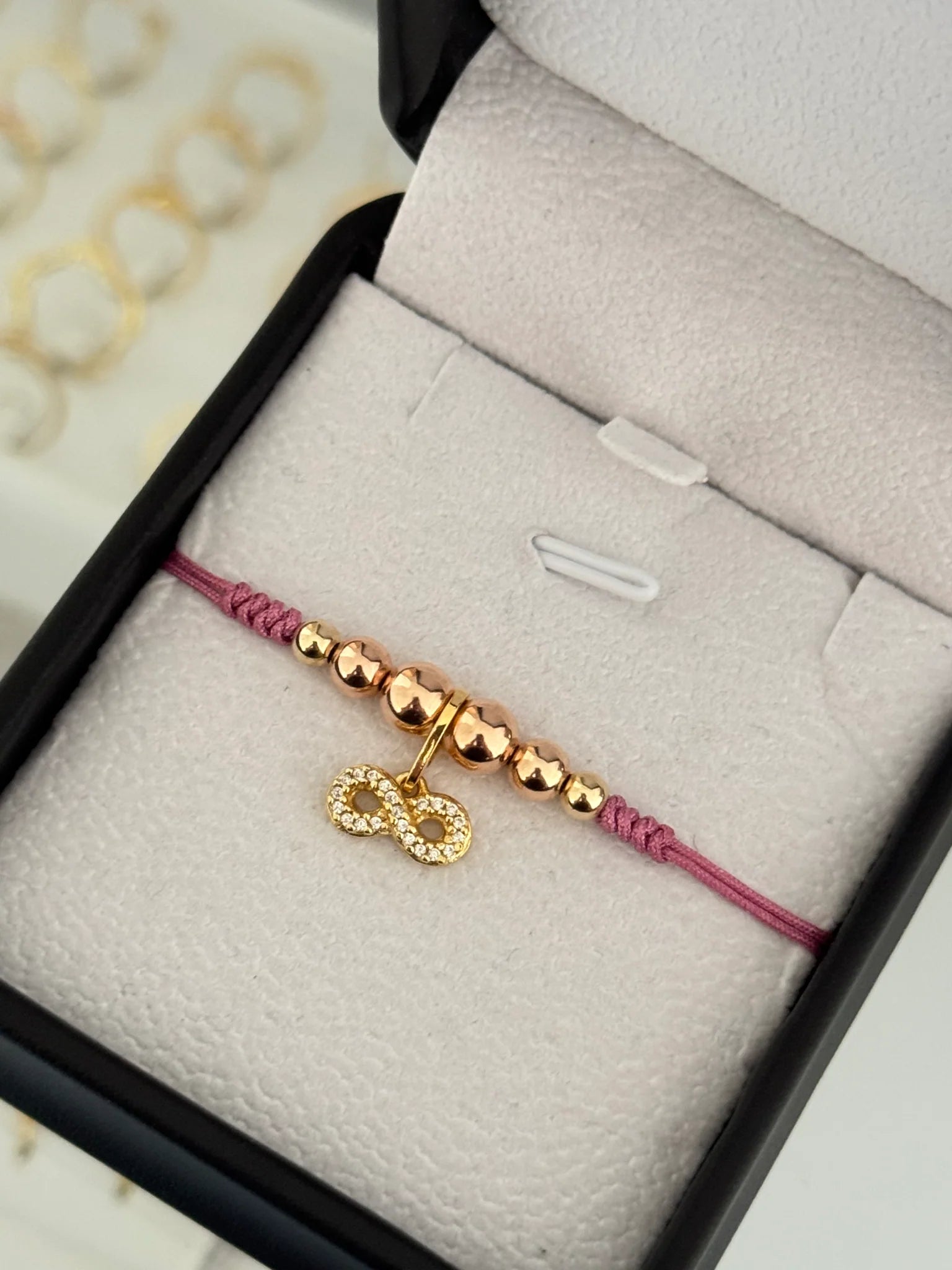 Pulsera infinito circonia oro rosa